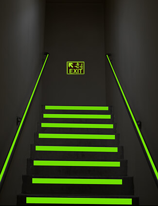 glow tape illuminating stairway in the dark